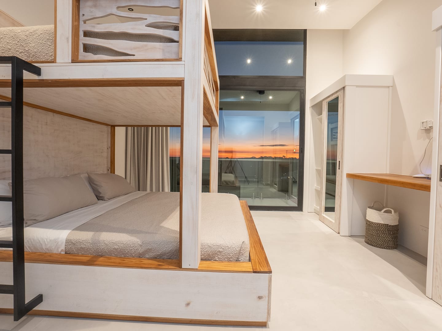 Third bedroom with a bunk bed and closet, open to the ocean view